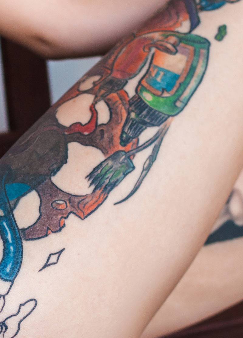 a person holding a tattoo